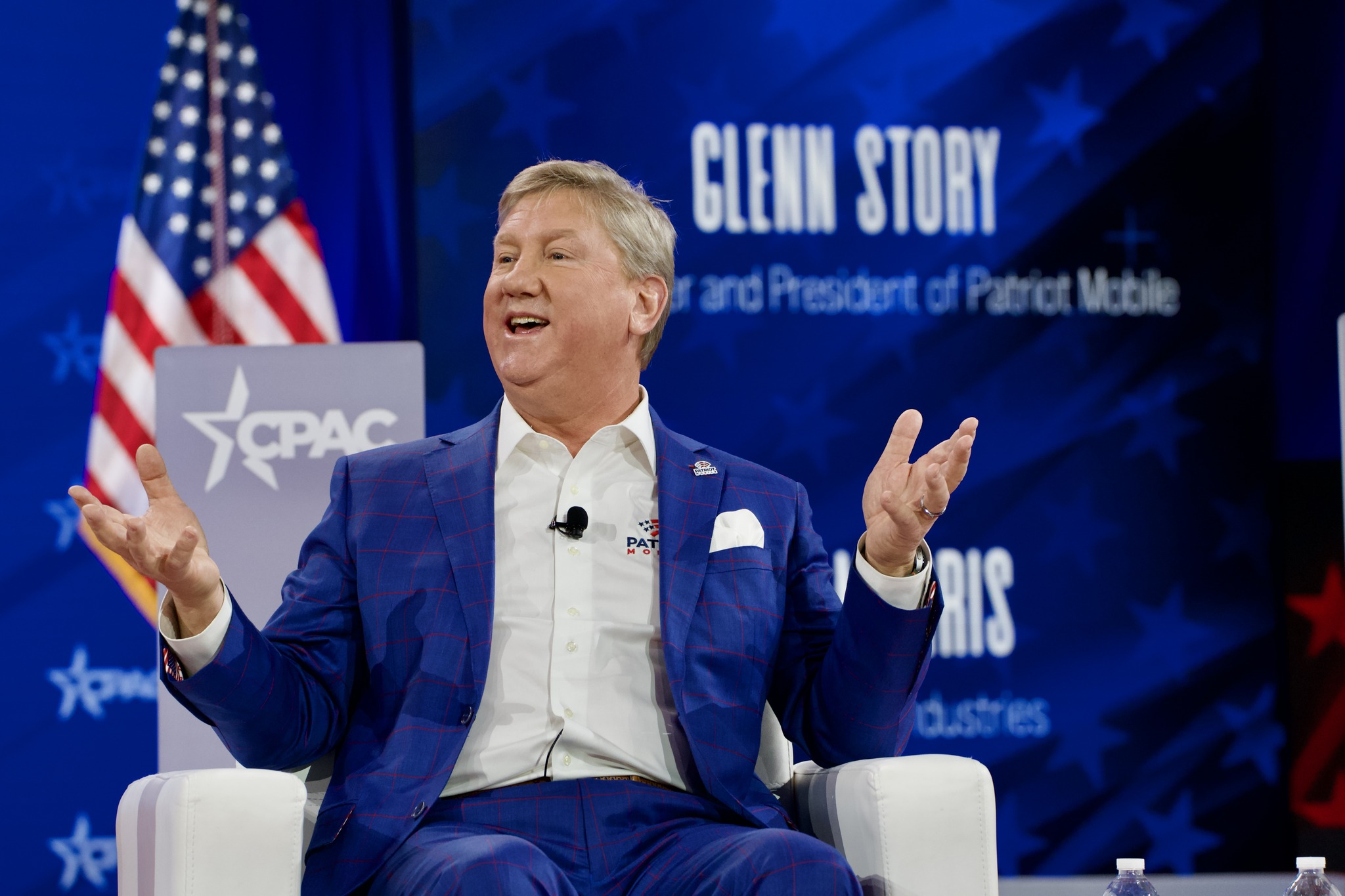 Glenn Story speaking at an event