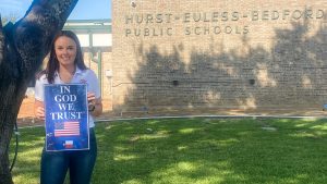 In God We Trust sign delivered to local school